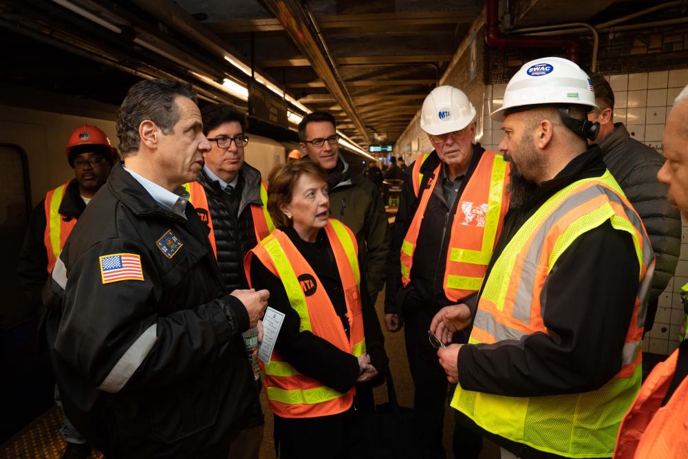 Engineers and Cuomo in tunnel