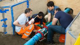 Researchers attach fiber optics to underground pipe