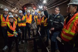 Engineers and Cuomo in tunnel